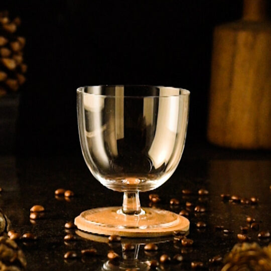 Cocktail glass with a small stem and a very wide body