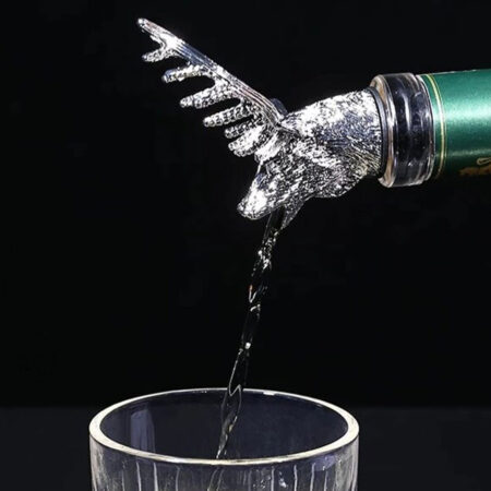 Deer Liquid Pourer Silver pouring liquid in a glass