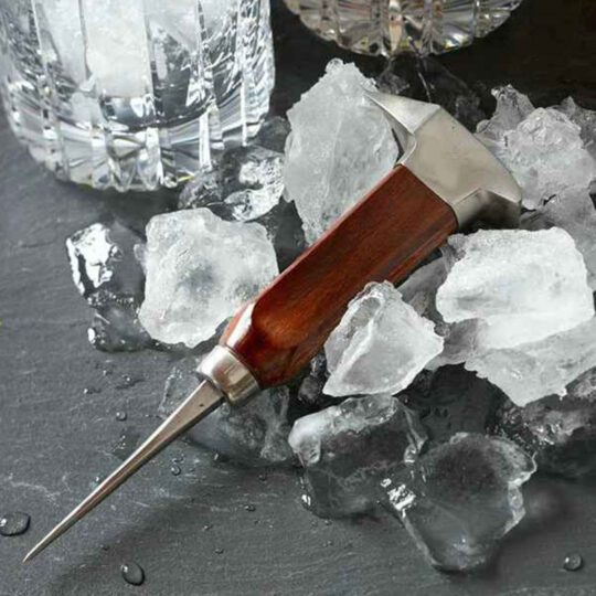 Anvil Head Ice Pick laying on ice cubes