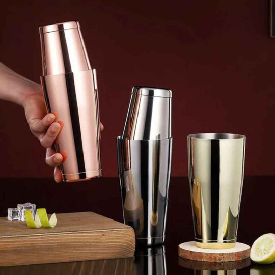 Three different colors of stainless steel Boston cocktail shakers