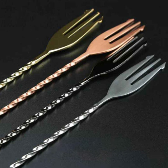 the fork opposite edge of Four stainless steel cocktail bar spoons