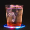 Round Colorful LED Light Pad beautifully lighting a Short Old Fashionedglass