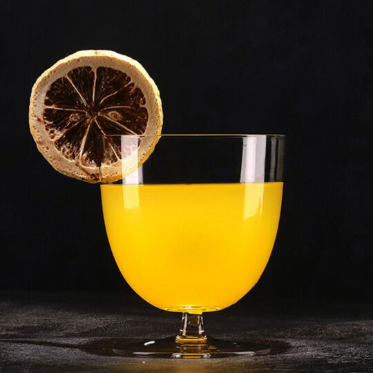 Orange cocktail inside a Short Stemmed Large Body Glass perfect for serving cocktails and drinks