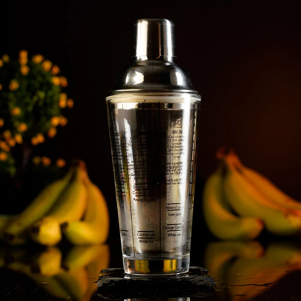 Glass Cobbler shaker with measurements engraved on it
