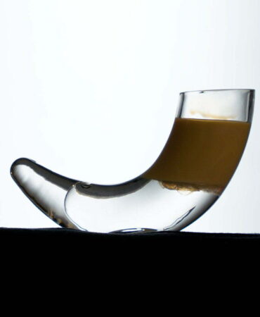 Horn shot glass with a two layers cocktail inside it