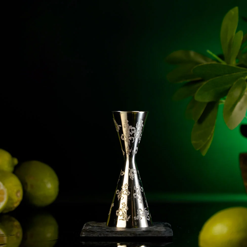 Engraved stainless steel jigger for measuring cocktail ingredients