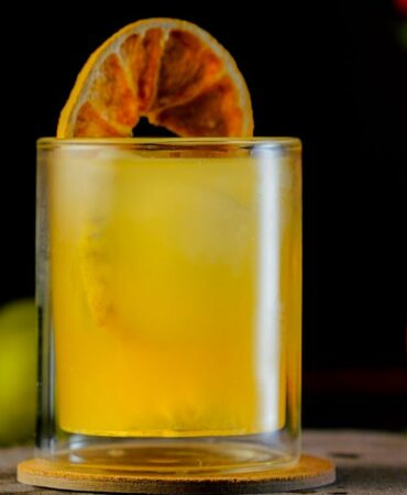 Orange Whisky Cobbler Cocktail inside a Short Glass