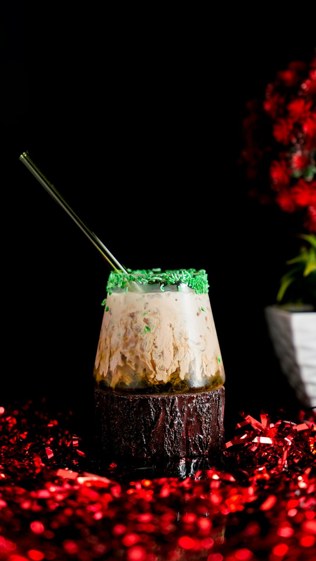 Irish Cream Pouring down in a sweet cocktail around a Christmas Background