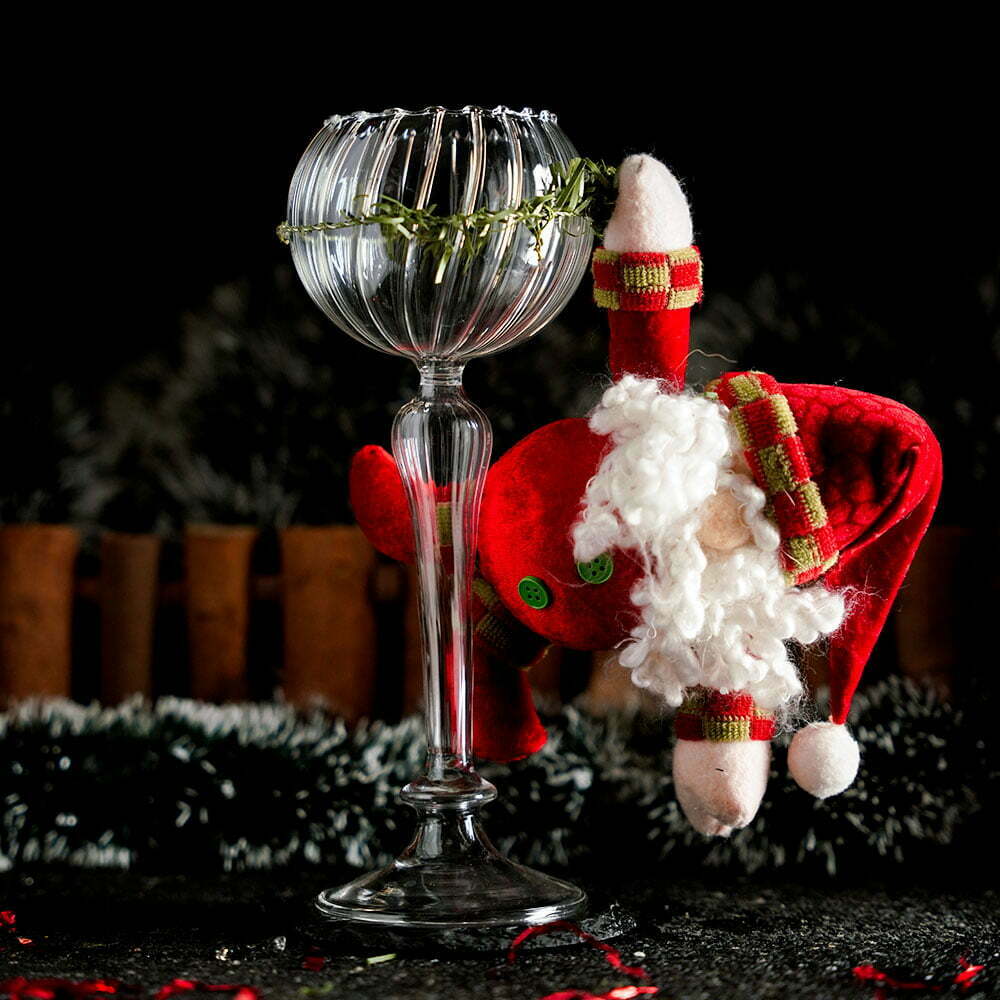 Exquisite Wine Goblet with a Santa Clause hanging up on it