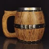 Viking-themed beer mug resembling a wooden barrel with metal bands and a sturdy handle, made of high-quality stainless steel and resin.