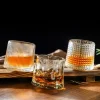 Sip & Swirl Collection featuring three premium whisky glasses: Vertico with vertical ridges, Dimpled with dimple-like indentations, and Crescendo with horizontal ridges, all with a unique rotating base.