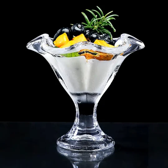 Eco-friendly The Elegant Tulip Glass with unique tulip-like shape designed for cocktails, showcasing wavy rim and clear stem on dark background.