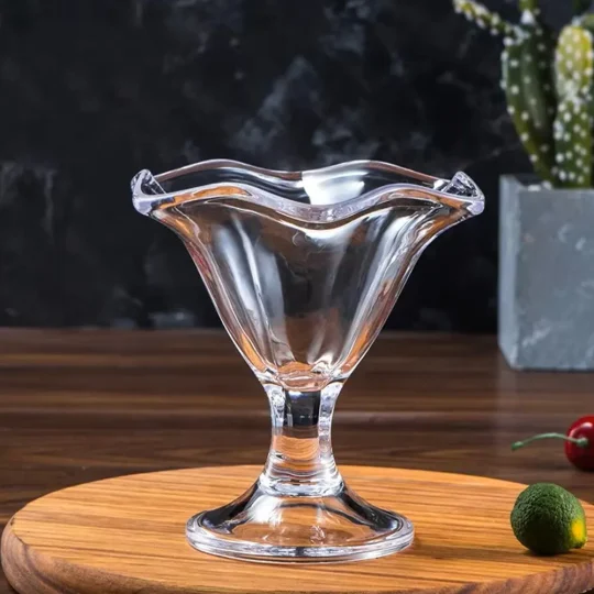 Eco-friendly The Elegant Tulip Glass with unique tulip-like shape designed for cocktails, showcasing wavy rim and clear stem on dark background